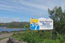 The sign for The Gavin Maxwell Museum on The Isle of Skye road bridge