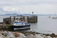The MV Shearwater at Port Mòr on The Isle of Muck